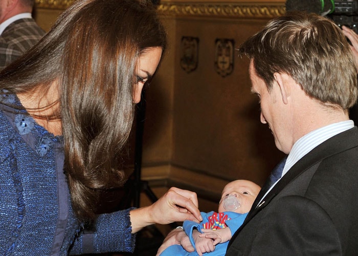 The always elegant Duchess of Cambridge dotes on three-week-old Hugo Eric Scott Vicary, the son of  Sergeant  Paul 'Vic' Vicary. The Royal couple met him at an event to mark the achievement of a group of polar trekkers at Goldsmiths Hall in London recently. Kate was mesmerized by the little one and said that the baby was "was very cute, and had doting eyes on him".