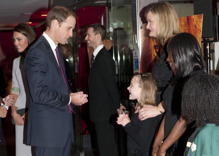 Prince William has been Tusk Trust charity's Royal Patron since 2005.  Tusk Trust has 40 projects in 17 African countries that aim to protect wildlife, alleviate poverty and encourage education in rural communities.<br><br>Here, Prince William meets with children prior to the premiere.