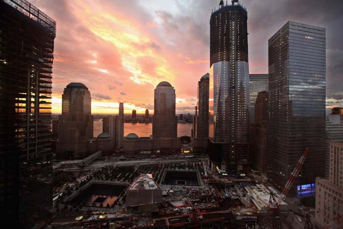 An eerie glow hangs over the 9/11 memorial at dusk.(AFP Photo)