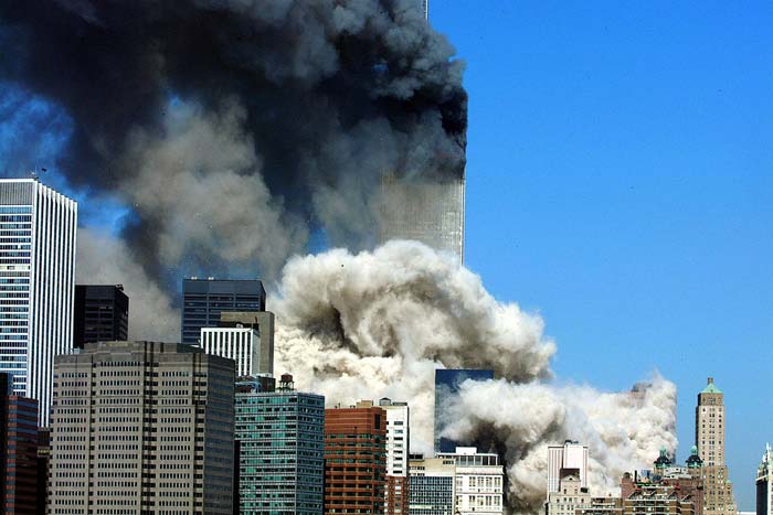 This 11 September, 2001 file photo shows smoke billowing after the first of the two towers of the World Trade Centre collapsed in New York City. Two planes crashed into the twin towers of the Centre. Another plane crashed into the Pentagon in Washington, DC and a fourth one crashed into a field in Pennsylvania. (AFP Photo)