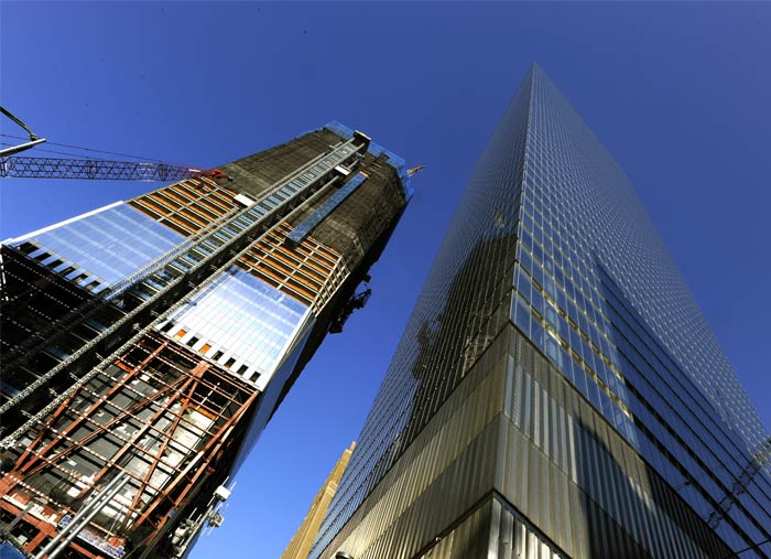 This picture from February 2011 shows the '1 World Centre', then under construction, which now stands 1,776 tall.<br><br>Besides the 104-storey tower, a 40-storey '4 World Trade Centre' and '7 World Trade Centre' have been constructed at the site. The memorial has twin reflecting pools, each nearly an acre in size, and feature the largest manmade waterfalls in North America.<br><br>Inscribed on bronze panels edging the pools are the names of every person who died in the 2001 attacks in New York, Pennsylvania and the Pentagon as well as the six people killed in the February 1993 World Trade Centre bombing.