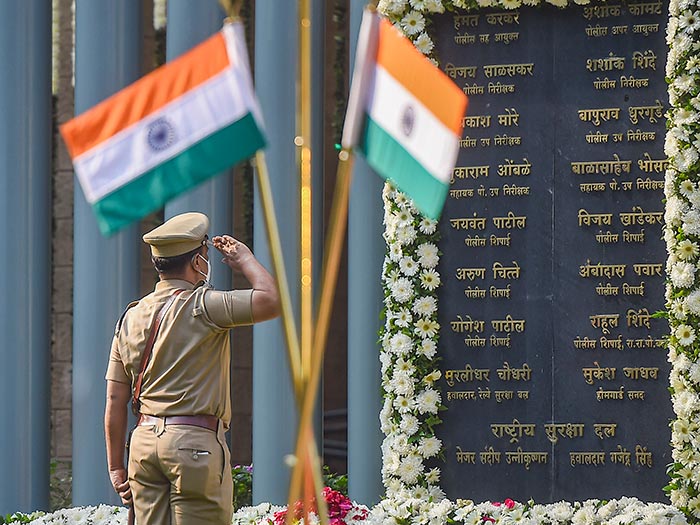 Police officers pay tribute to the victims at the Police Martyrs Memorial to mark the 13th anniversary of the 26/11 terror attacks.