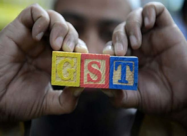 Photo : जीएसटी (GST) : क्या बढ़ेंगे जरूरी चीजों के दाम?