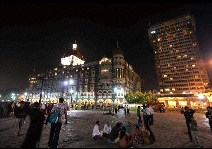 The illuminated Taj Hotel on the second anniversary of 26/11 Mumbai terror attacks in Mumbai on Thursday.<br><br>

After the 26/11 attacks the hotel's interiors were charred. Its walls were marred by bullet holes and grenade blasts, its corridors were soaked in blood. The hotel has now been renovated back to full glory. (PTI Photo)