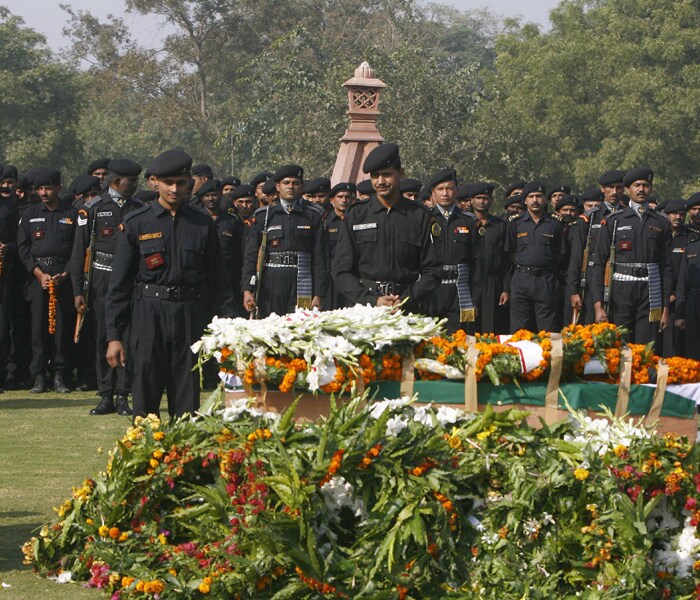 Gajendra Singh, was brought to Delhi before being taken to his native place Dehradun for the last rites. All ranks and file of the elite force gathered at NSG headquarters in Palam to pay their tributes to the slain commando.(AFP photo)
<br><br>
<b>NDTV's tribute to Mumbai martyrs</b><br><br>

<object width="192" height="20" data="http://drop.ndtv.com/audio/player/mp3player.swf" type="application/x-shockwave-flash">

<param name="movie" value="http://drop.ndtv.com/audio/player/mp3player.swf" />

<param name="FlashVars" value="mp3=http://drop.ndtv.com/audio/news/2611_tribute/mumbai_attacks_26_11_a_tribute_to_the_martyrs_low.mp3&amp;buttoncolor=ffffff&amp;buttonovercolor=000000&amp;bgcolor1=7d7d7d&amp;bgcolor2=333333&amp;sliderovercolor=ffffff&amp;showstop=1&amp;showvolume=1&amp;autoplay=0" /></object><br /><br>

<a href="http://drop.ndtv.com/audio/news/2611_tribute/mumbai_attacks_26_11_a_tribute_to_the_martyrs_high.zip" class="fbld fn fl">Click here to download MP3</a> [1.55 MB]