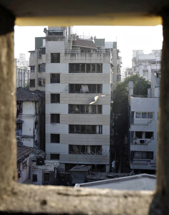 Restoration work recently started at the Nariman House and is going on in full swing. The temporary construction is expected to finish soon and then, will begin complete restoration. Bringing back memories of the gruesome massacre, the walls inside still have bullet and grenade splinter marks.(AFP photo)