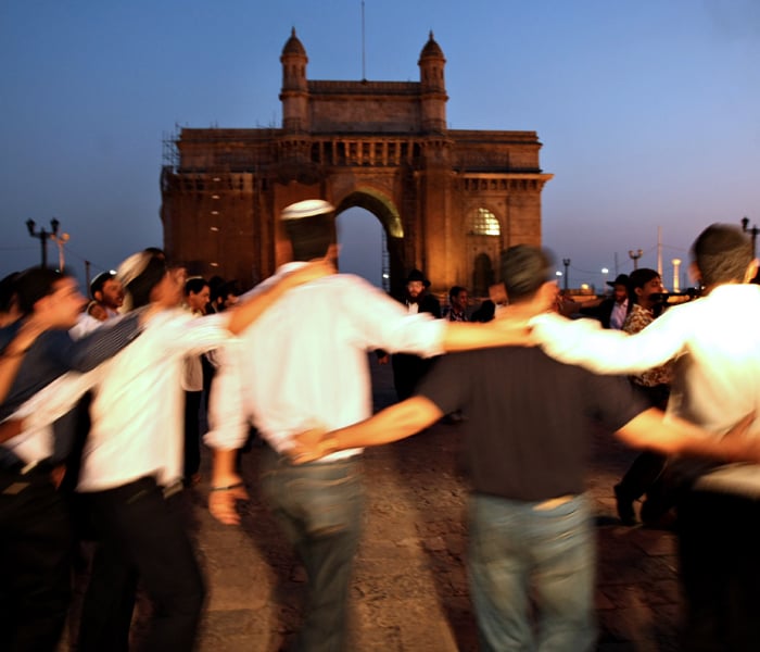 There are still protest marches, candle light vigils, condemning banners or posters, and human chains in rememberance of the attacks. A year after 26/11, Mumbaikars, still bleeding and angry from the nightmare that lasted nearly 72 hours, are rebuilding their lives, little by little. Life, as they say, goes on.(AFP photo)