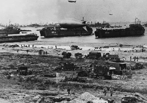<span class="lh16 fa fs12 fb">US troops disembark from landing crafts during D-Day 06 June 1944 after Allied forces stormed the Normandy beaches. D-Day, 06 June 1944 is still one of the world's most gut-wrenching and consequential battles, as the Allied landing in Normandy led to the liberation of France which marked the turning point in the Western theater of World War II. (AFP Photo)</span>