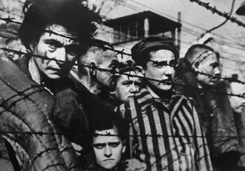 <span class="lh16 fa fs12 fb">A picture of inmates behind barbed wire taken in 1945 when the concentration camp of Auschwitz was liberated in Poland where millions of Jewish deportees were exterminated by Nazis during World War II. (AFP Photo)</span>