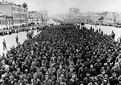 <span class="lh16 fa fs12 fb">Red Army men escort 13 September 1944 through Moscow streets some of 57,000 German World War II prisoners captured by the Russian forces since 17 July 1944 march. Hitler's Germany invaded the Soviet Union 22 June 1941. In April 1944, the USSR retook Odessa, German troops surrendered in the Crimea in May and in July the Red Army retook Minsk. 02 May 1945 Soviet troops completed the capture of Berlin. WWII in Europe was over. (AFP Photo)</span>