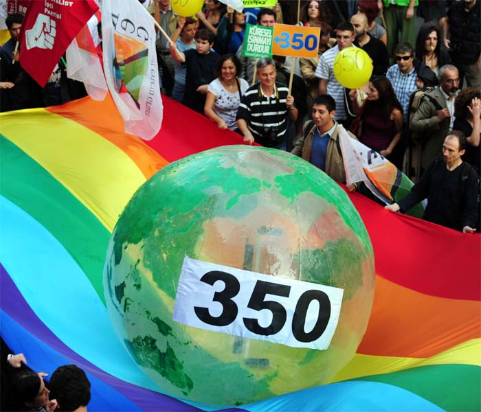 Turkish climate activits carry a large &quot;Earth ball&quot; bearing the logo 350 to call for carbon emissions cuts to 350 parts per million (ppm) during a protest on International Day of Climate Action about global warming at Istiklal Avenue in Istanbul. (AFP)