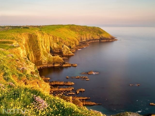 7. Travel the Wild Atlantic Way: Stretching 2,500 km, the Wild Atlantic Way is one of the world's great road trips. It passes dramatic cliffs, surf beaches and traditional towns, from Donegal's coastline to Lahinch's lively shorelines.