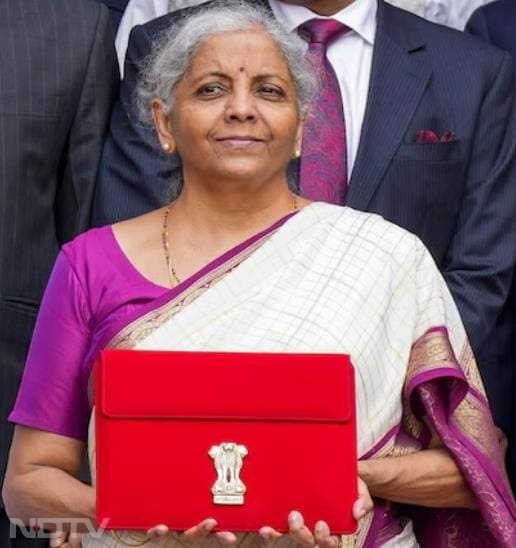 Presenting the Union Budget 2024-25, Nirmala Sitharaman opted for a white silk saree with a purple and gold border