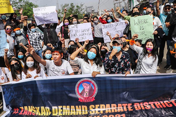 Members of the All Zanskar Student Association raise slogans during a protest demanding a separate district for Zanskar valley, in Jammu.