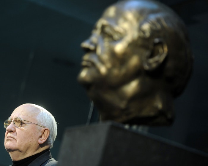 The former President of the Soviet Union Mikhail Gorbachev stands next to a bust of himself by French artist Serge Mangin after unveiling it to guests in Berlin. (AFP Photo)