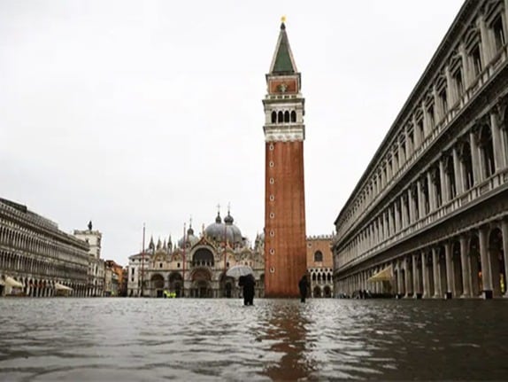 Venice's St Mark's Square was under water on Tuesday after a newly installed system of mobile artificial dams failed to activate. Residents -- long accustomed to perennial "acqua alta" or high water events -- pulled on their rubber boots once more to deal with flooding that reached a high of 1.37 metres (4.5 feet) above sea level in the afternoon.