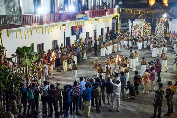 Priests perform 'Pallivetta' rituals before the Sree Padmanabhaswamy temple as part of the 'Alpasi' festival in Thiruvananthapuram.