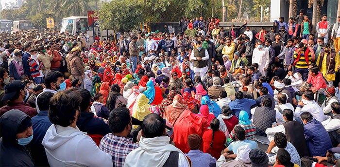 Farmers stage a protest against the new farm laws, in Noida.