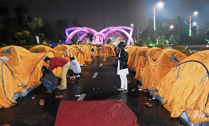 Farmers setup makeshift tents at Chilla border during the ongoing protest against the new farm laws, in Noida.