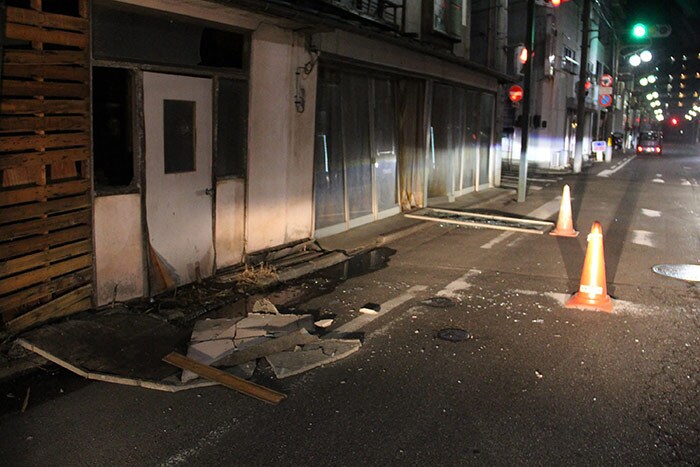 Damaged buildings are seen in Fukushima on February 13, 2021 after a strong 7.1-magnitude earthquake struck late off the eastern coast of Japan but no tsunami warning was issued, Japanese authorities said.