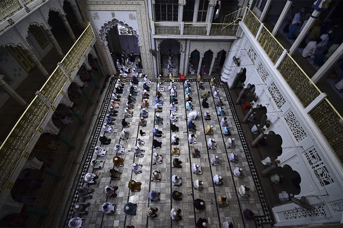 Devotees offer Friday prayers at the Vasi Ullah mosque during the holy month of Ramadan in Allahabad.