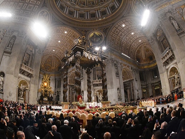 Pope Francis leads a Christmas Eve mass in St Peter's Basilica to mark the nativity of Jesus Christ at the Vatican.