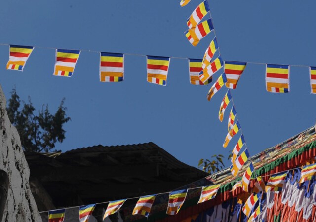 Along with the Indian Tricolour, a string of Tibetan flags crisscrosses the Tawang monastery. While an emblem of Tibetan independence movement, the Tibetan flag is also a symbol of separatism for the People's Republic of China and it's banned in that country. While the Dalai Lama's visit was meant to be religious, the flags certainly convey a more political message.<br><br>According to a Chombay youth activist, "Since he is our religious and spiritual head, we have our sympathies for sure because the border that Tibet shares with India is Arunachal Pradesh and particularly Tawang. India should support the cause of Tibet."  (AFP Photo)
<p><a class="fbld fn fl" href="http://www.ndtv.com/news/blogs/heart_of_the_matter/the_dalai_lama_speaks_out.php">Blog: The Dalai Lama speaks out</a></p>