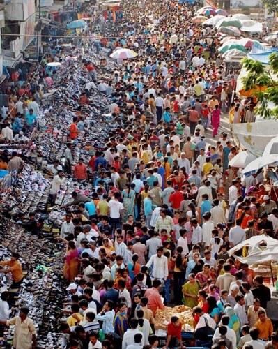 <b>Festival fever:</b>: People throng the Teen Darwaja Market of Ahmedabad for shopping ahead of Diwali. (PTI )