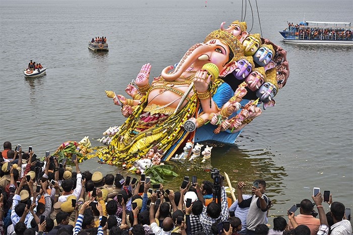 Devotees immerse Lord Ganesh's idol after  11-day long Ganesh Utsav celebrations in Hyderabad