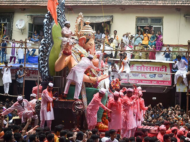 Devotees carry the Ganesha idol of Lalbaugcha Raja for immersion in Mumbai