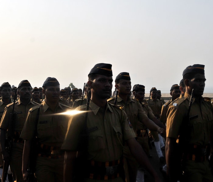 On the first anniversary of the Mumbai terror blasts, in what is slated as a show of strength by the Maharashtra government, the Mumbai Police armed with its latest acqusitions, from AK-47s to amphibious vehicles march down Mumbai?s Marine Drive from the Trident Hotel to Girgaum Chowpatty. (AFP Photo)