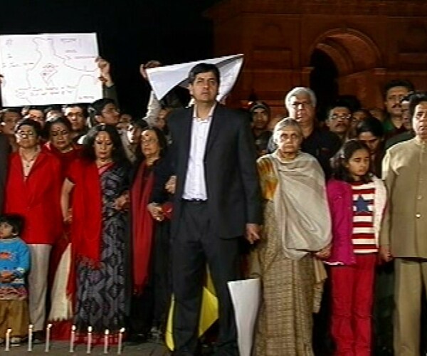 Delhi Chief Minister Sheila Dikshit also seen observing a minute of silence among others at New Delhi's India Gate.<br><br>"Let people know no one can divide us. We are Indians first and Indians last," said the Chief Minister.(NDTV Photo)