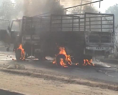 The labourers torched more than six vehicles in the city, pelted stones and jammed the national highway. (NDTV Photo)