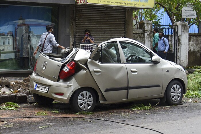 A car damaged in Mumbai due to Cyclone Tauktae on Monday