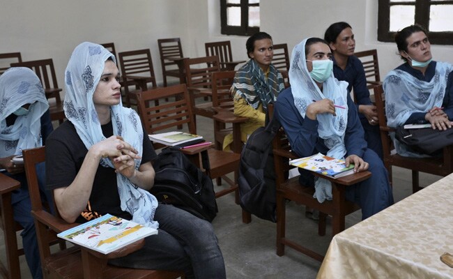 Transgender persons attend class at a school on July 9, 2021 after a provincial education minister of Pakistan said the first government-run school was opened for transgender students in Multan.