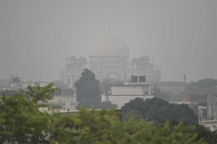 Humayun's Tomb is seen under heavy smog conditions in Delhi on Wednesday