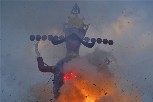 An effigy of demon king Ravana is burned as part of Dussehra festivities, in Jammu, India on Sunday. Dussehra, also known as Vijayadashami, is the culmination of Navaratri, or nine nights festival and a celebration of the victory of good over evil.