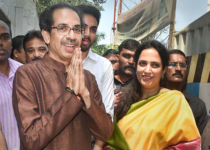 Shiv Sena President Uddhav Thackeray with wife Rashmi Thackeray and son Tejas Thackeray (centre in white shirt) are seen as Yuva Sena President Aditya Thackeray filed nominations papers from Worli for Maharashtra Assembly polls