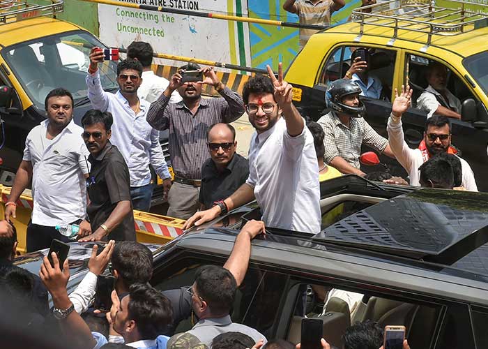 Yuva Sena President Aaditya Thackeray greets his supporters after he filed his nominations papers from Worli for Maharashtra election, in Mumbai