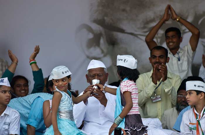 Social-activist Anna Hazare has finally broken his fast. Anna was given sugar water by a five-year-old girl from the Sunder Nagar Dalit Basti, the daughter of  volunteer from the India Against Corruption (IAC).<br><br/>

Anna ended his fast because Parliament, sitting in debate on Saturday, unanimously accepted his three must-have conditions for inclusion in the Lokpal Bill.