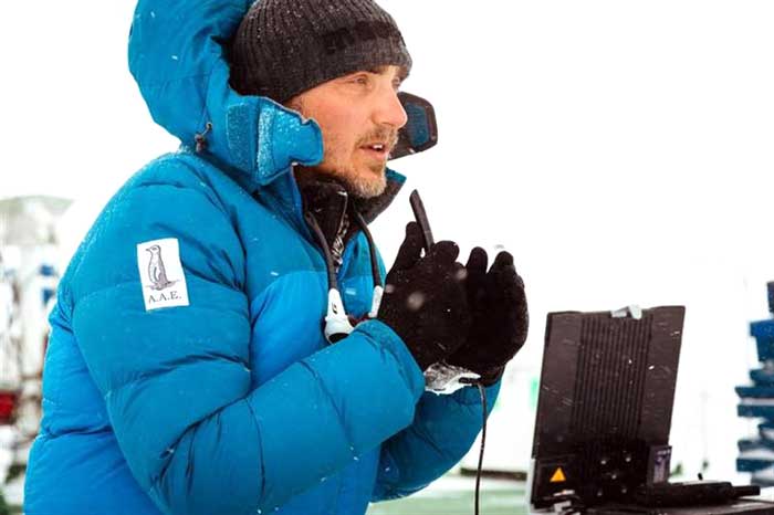 Professor Chris Turney, leader of the Australasian Antarctic Expedition, is pictured talking to international media from the top deck of the stranded ship in Antarctica on December 30, 2013.