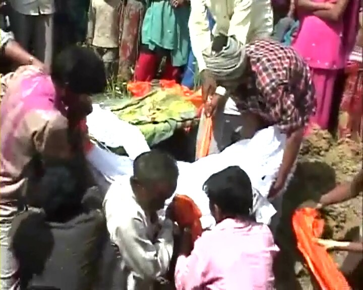 A body is being lowered inside a grave. Twenty-six mothers died and 37 children also lost their lives. This really makes you wonder whether this was just a tragic accident or is this price you pay for being poor.