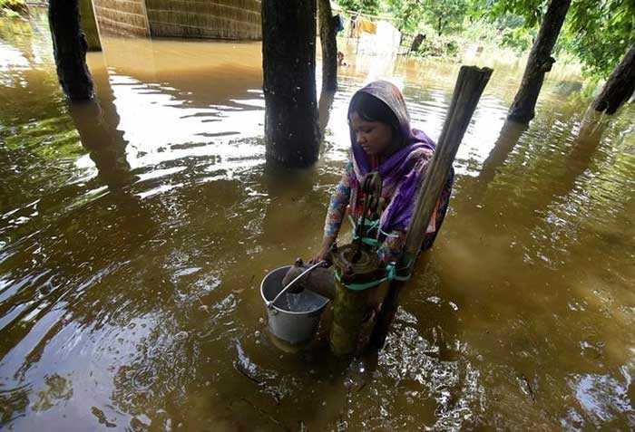 Pics: Floods Cause Havoc In Assam, Houses Evacuated