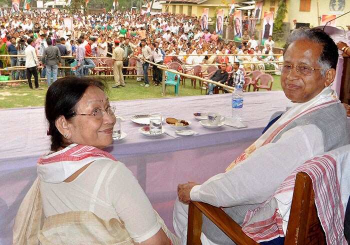 Assam Chief Minister and Congress candidate of Titabor constituency Tarun Gogoi along with his wife Dolly Gogoi during his election campaign at Borhila in Titabor.