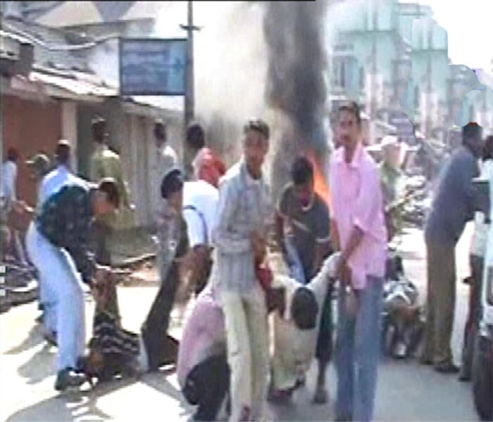 According to the police, three persons were injured when a bomb, planted in a bicycle, went off at a spot adjacent to the police station at around 9:30 am.