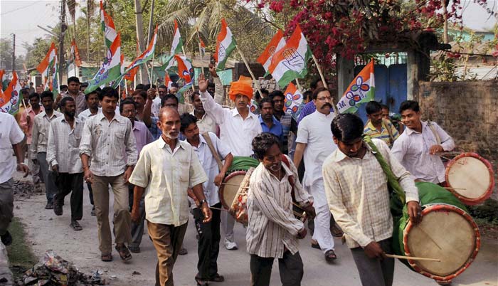 Trinamool Congress candidate Goutam Dev with his supporters at a rally in Siliguri as part of his campaign for the upcoming West Bengal assembly elections. (PTI Photo)