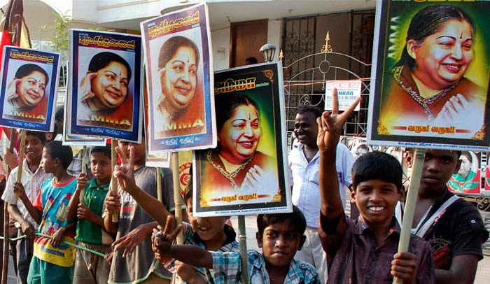 Young AIADMK supporters await their party's supremo J Jayalalithaa at an election campaign rally at Srirangam in Tiruchirapalli ahead of the upcoming Tamil Nadu assembly elections. (PTI Photo)