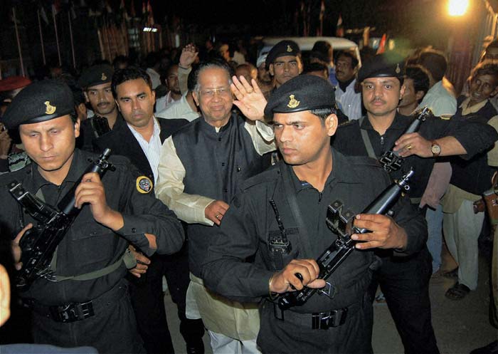 Assam Chief Minister Tarun Gogoi arrives for a public meeting at Dibrugarh for the upcoming Assam assembly election. (PTI Photo)