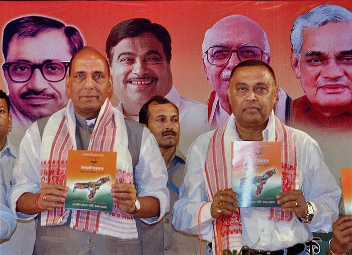 Senior BJP leader Rajnath Singh and the party's Assam unit chief Ranjeet Dutta release the party's manifesto in Guwahati ahead of the forthcoming Assam assembly elections. (PTI)
