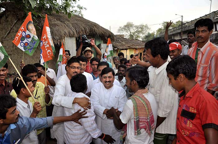 A Trinamool Congress candidate of the Sagardighi Subrata Saha meets locals during an election campaign in Murshidabad ahead of the West Bengal assembly polls. (PTI)